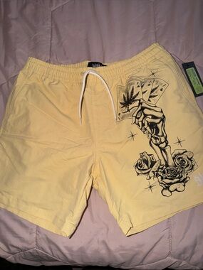 Empyre Yellow Swim Trunks with Black Skeleton & Rose Graphic